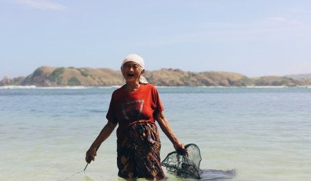 A woman fished on the daylight at Lombok, West Nusa Tenggara