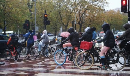 People riding bicycle.