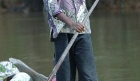 A man canoeing in Orientale, Democratic Republic of the Congo. Flickr/Julien Harneis