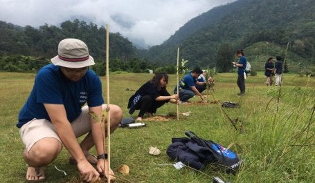 WRI Indonesia’s team in a tree planting offset project in West Java, March 2019. Photo credit: WRI Indonesia