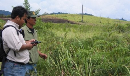 Members of the POTICO field team surveys a tract of degraded land in West Kalimantan province as part of a process to identify areas potentially suitable for sustainable oil palm plantation expansion. Photo Credit: Sekala
